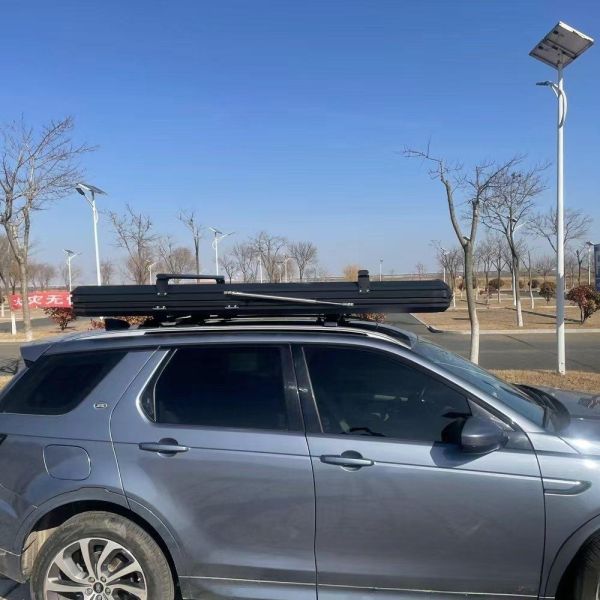 Factory Latest Roof Tent Outdoor Camping Carrying Solar Aluminum Shell Triangle Fully Automatic Roof Tent