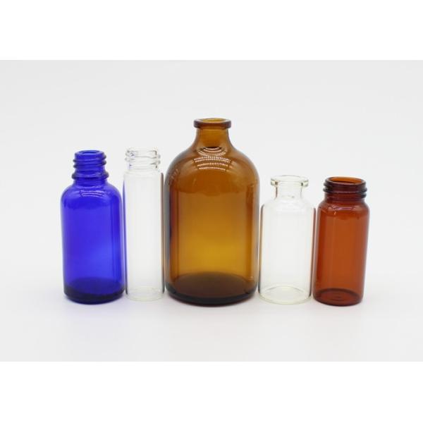 Фармацевтическая или косметическая небольшая стеклянная бутылка