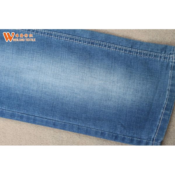 China Stocklot Cotton Poly Stretch Denim Fabric for Jeans Garments