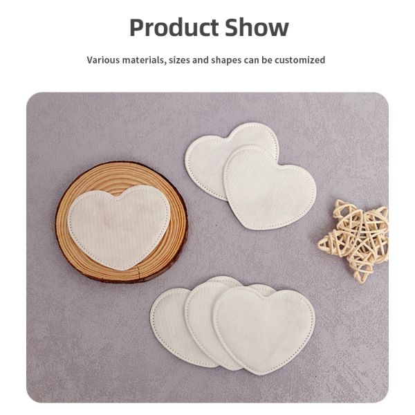 Discos de algodón desechables biodegradables en forma de corazón ecológicos OEM para desmaquillar