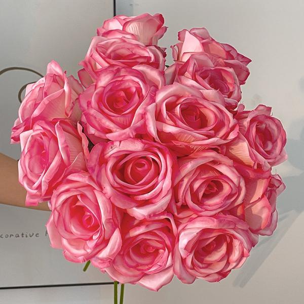 A single broken ice blue rose with a realistic touch for Valentine's Day home decoration shoot, featuring Ecuadorian roses