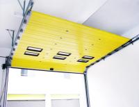 Porte sectionnelle haute sécurité verrouillable à manœuvre avec glissière isolée en acier galvanisé