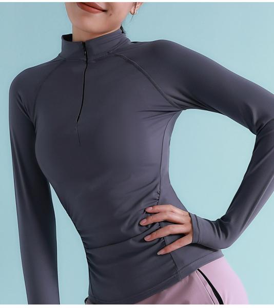 Das mulheres camisetas de corrida da luva por muito tempo