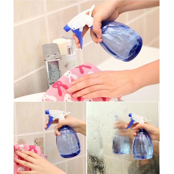 Пурпурные косметические брызги разливают бутылки по бутылкам брызг чистки кухни ежедневной жизни