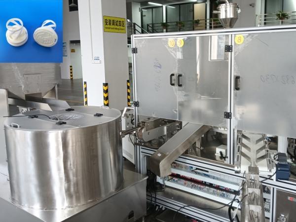 自動シリカジェル乾燥剤キャップ 密封装列を埋める機械 乾燥剤の供給箱付き 乾燥剤を湿気と汚染から保護する