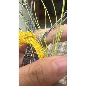 Filamentos con revestimiento de poliéster y con revestimiento de fibra de poli