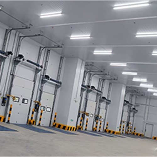 Vertical Lift Industrial Sectional Doors 0.2m/s-0.4m/s  For Power Generation Facilities