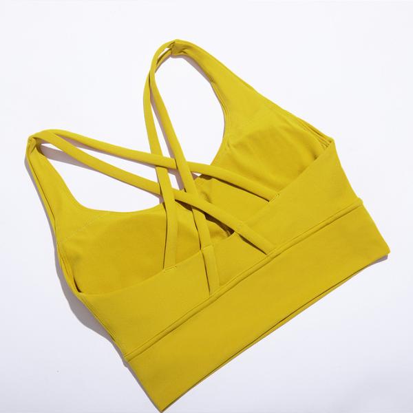 OEM / ODM Дизайн бюста Красивые поперечные ремни Назад Трехмерный смысл Йога Майка Весна Спортивная одежда Йога Жилет