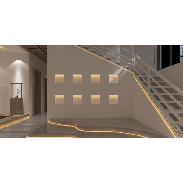 MODERN ZEN-INSPIRED SPACE BLENDS SOFT AMBIENT LIGHTING, NATURAL WOOD TEXTURES, AND FLOWING STONE PATHWAYS. THE CIRCULAR WINDOW AND NEUTRAL TONES CREATE A SERENE ATMOSPHERE