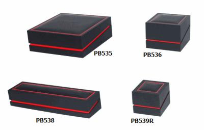 Black Plastic Jewelry Boxes with Red Frame on the outside top adn edge