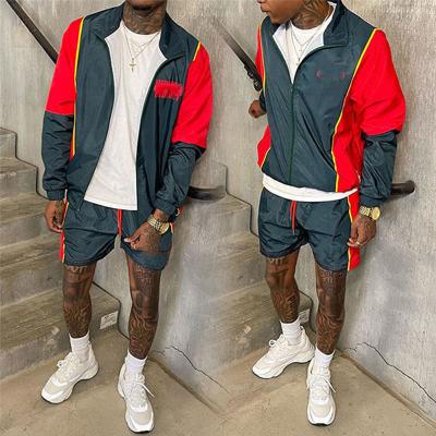 Embroiderie de logo personnalisé Maillots de course minces en deux pièces Maillots de course en nylon polyester Windbreaker Fermeture à glissière Vêtement de sport court pour hommes