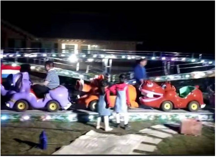 4 - 7km/H Speed Mini Roller Coaster 380v 8.8kw Rated Power 1.4m * 90cm Trolley Size