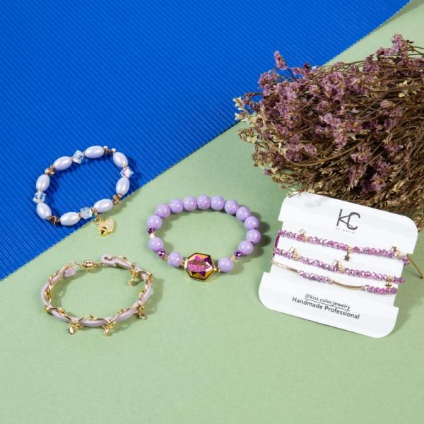 O grupo feito a mão Boho da joia do festival do surfista da hippie trançou a cor roxa romântica