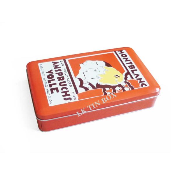 A caixa da lata do presente do metal do retângulo desenrolou a borda para o feriado do Natal