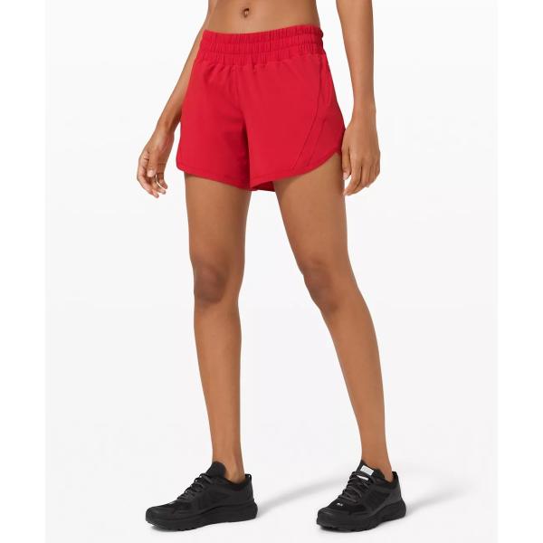 Шорты и разминка женщин идущие замыкают накоротко сторону с карманом молнии для спорт