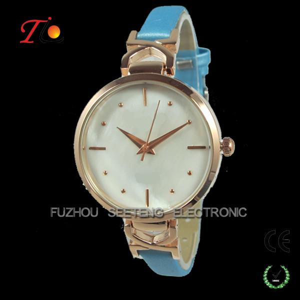 Beautiful thin gold color lady wrist watch with shell dial face