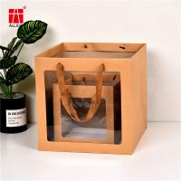 La coutume a imprimé le sac de papier de cadeau de luxe blanc noir d'achats avec la poignée
