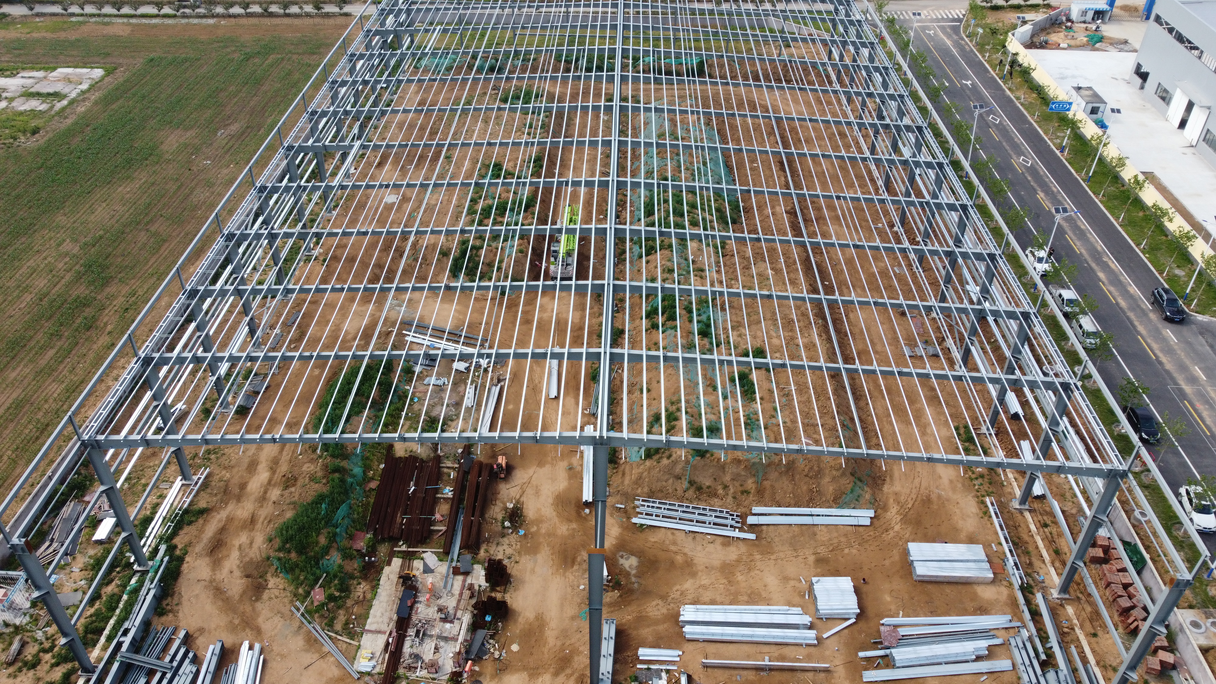 Q235B Q355B ASTM A36 Prefab Steel Frame Building For Warehouse Workshop Custom Design