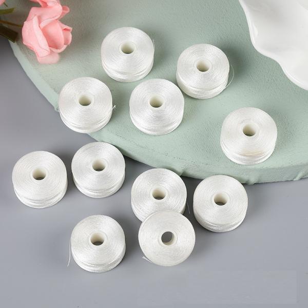 Диаметр 2 см Вышивка Нижняя нить Белая безграничная L-тип 75D/2 Шаттл Ядро Шитье Преглубокое Боббин 6