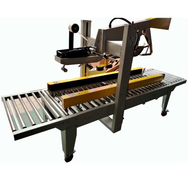 Drive hot melt glue carton sealing machine on both sides of the conveyor belt carton sealing machine