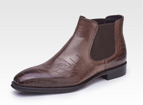 O vestido completo do fecho de correr do lado dos homens do couro de grão carreg em volta das botas de couro do preto dos homens do dedo do pé