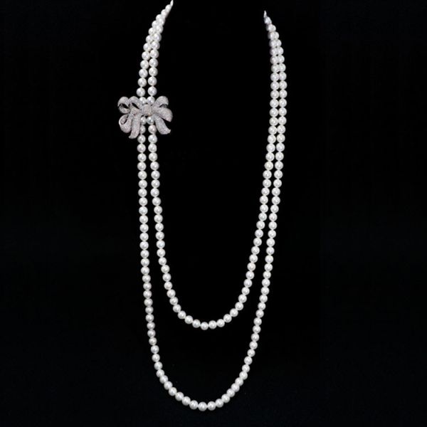 Women White Shell Pearl Double Strands Sweater Necklace with Cubic Zirconia Bow Charm (SN702143BOW)
