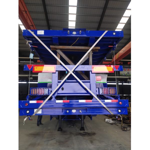 Overall Dimension 12500mm 2500mm 1530mm Flat Bed Semi Trailer Equipped with 12 Wheels Transporting Large Heavy Goods