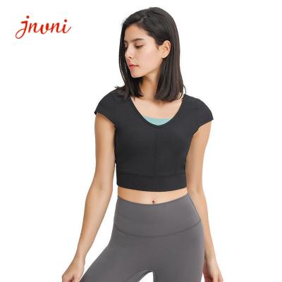 Les sports en plein air arrières croisés en forme de V de T-shirts à nervures d'Activewear cultivent le dessus