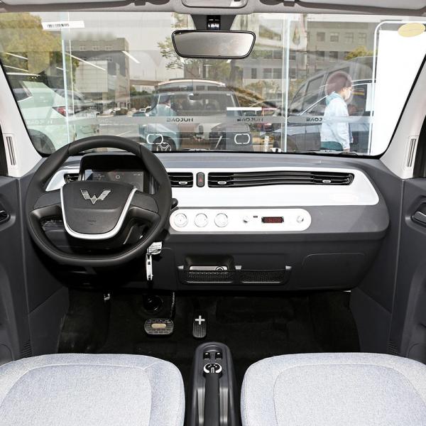 China Mini Car 4 Seater Hatchback 3 Door Electric Car Pure Yellow