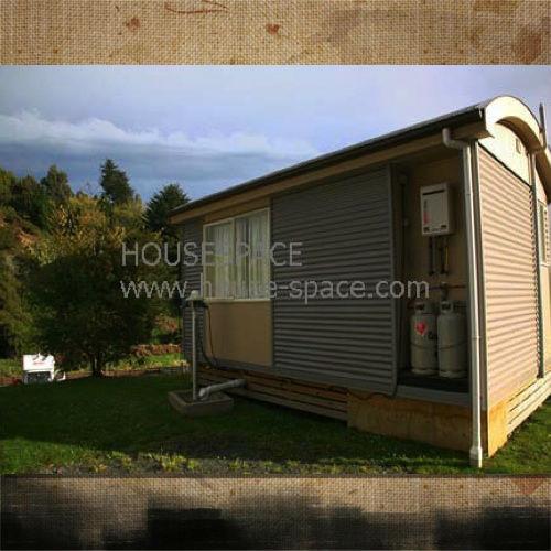 Casa modular moderna galvanizada acolhedor da madeira, casa de campo pequena com a parede de cortina para férias