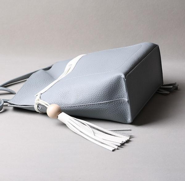2016 summer new Korean fashion spell color tassel leather handbag drawstring shoulder bag packet header layer of skin