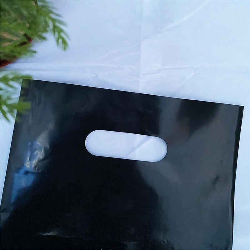 Customized black polyethylene plastic T-shirt bag with four-finger flat pockets, suitable for supermarket, clothing and shoe store logo printing options