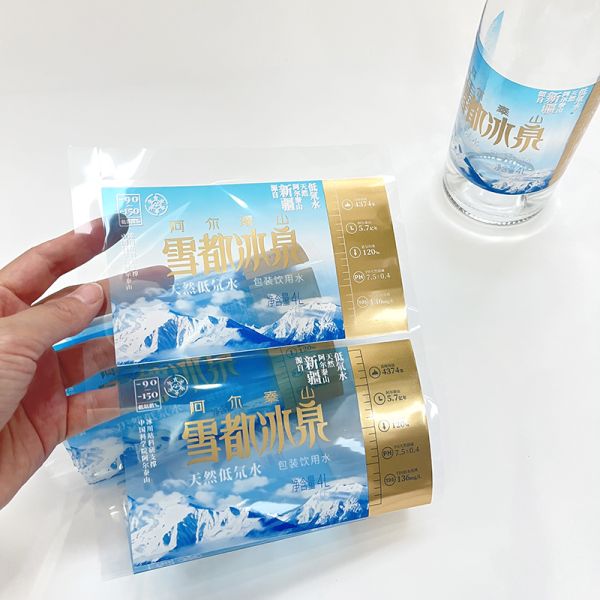 2024 Custom Transparent Water Bottle Labels Sticker Vinyl Waterproof Clear Gold Foil Logo Mineral Water Label Design