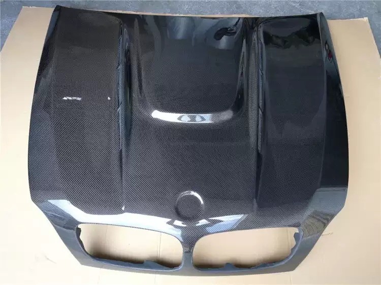 Transform Your BMW X6M E71 with HAMANN Carbon Fiber Front Cover and Spot Design