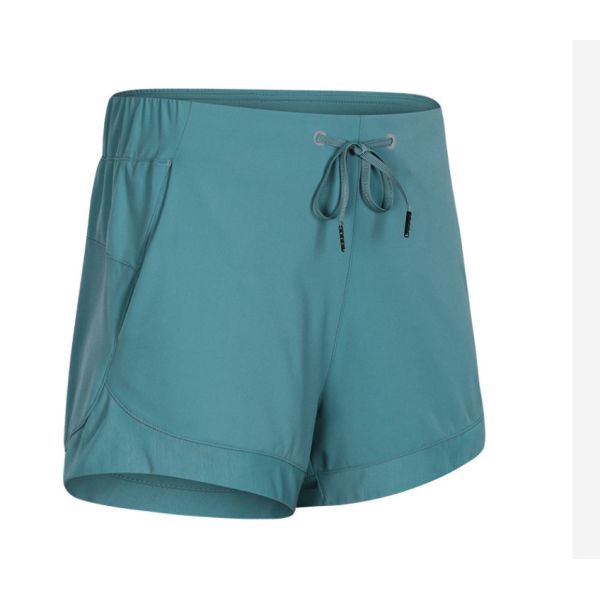 Ход фитнеса женщин замыкает накоротко высокие спорт талии разминка замыкает накоротко с карманами