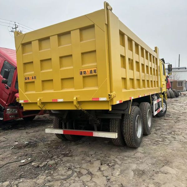 2009 Used HOWO 10 Tires Cabin 2 Axles 20 CBM 371HP Air-Condition Dump Truck with ABS