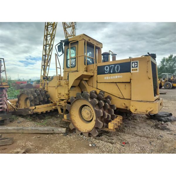 Camión compactador de basura industrial CAT 815B compactador de vertederos