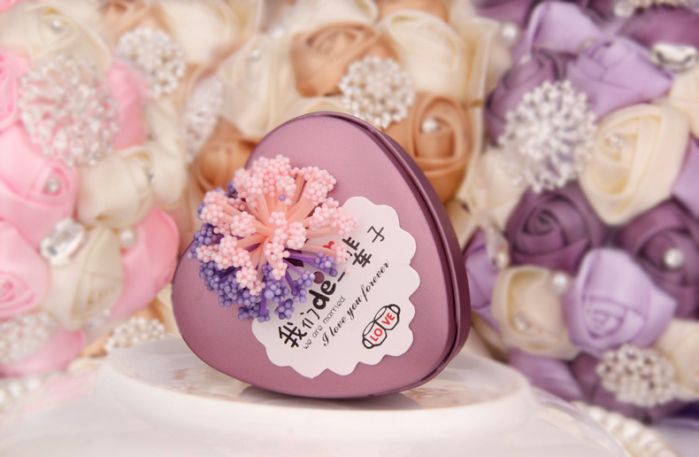 Os recipientes pequenos Nivea da lata da promoção entregam o creme do cuidado da cara do cuidado, latas dos doces do metal