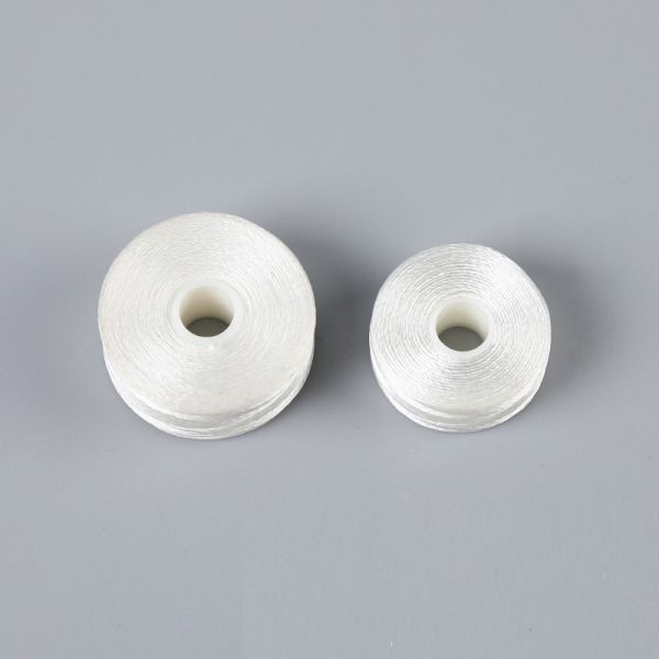 Диаметр 2 см Вышивка Нижняя нить Белая безграничная L-тип 75D/2 Шаттл Ядро Шитье Преглубокое Боббин 6