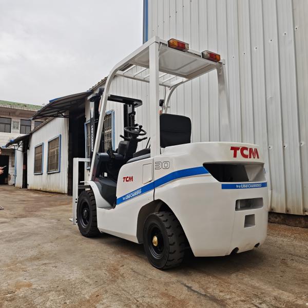 Used TCM 3-Ton 3-Cylinder Diesel Forklift, White Color, Robust Steel Frame, Designed For Industrial Material Transport