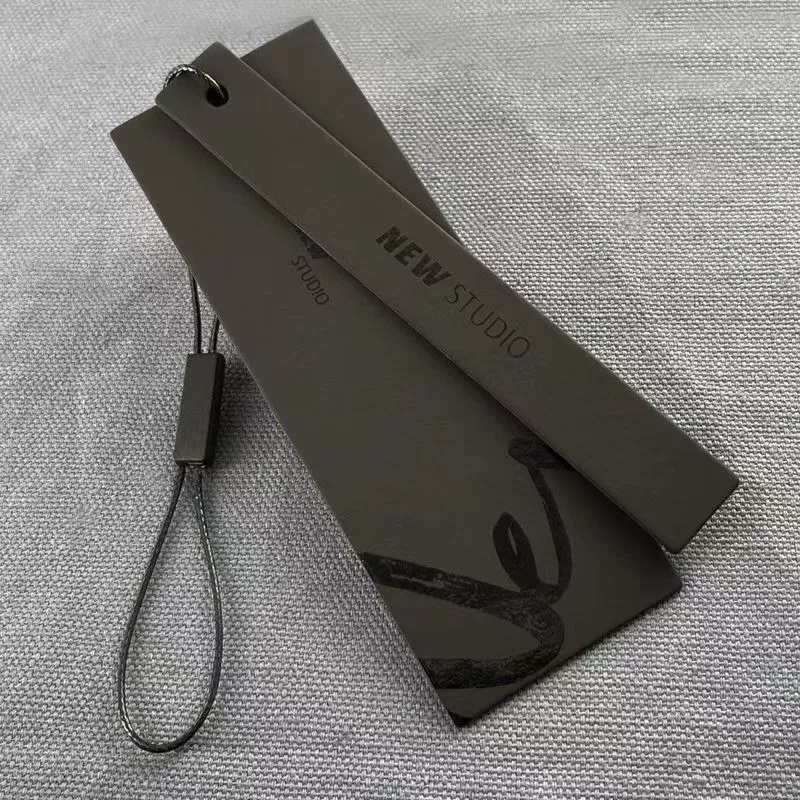 Multi-Layer Black Paper Hang Tags With Spot UV Finish For Apparel Branding