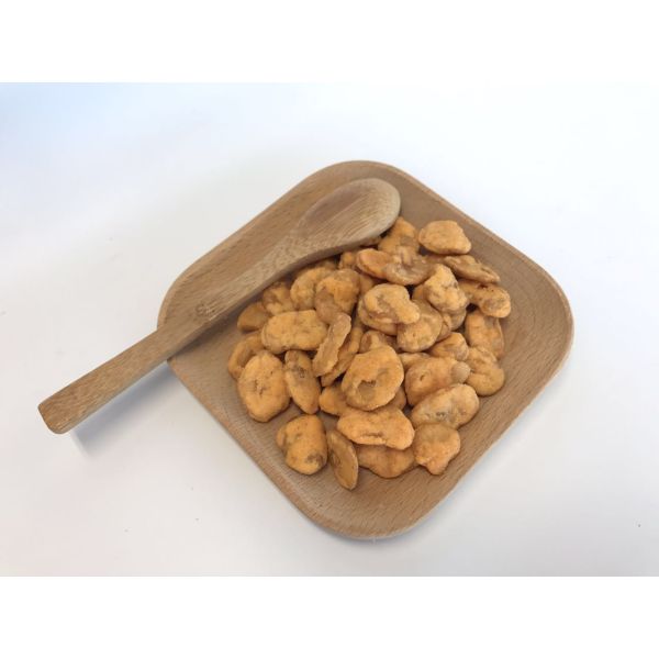 La fractura secó el condimento cubierto color amarillo tamizado tamaño curruscante picante de las habas