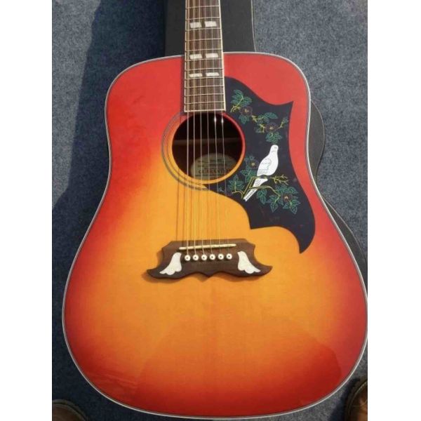 2018 Orange Sunburst Dovo acoustic guitar