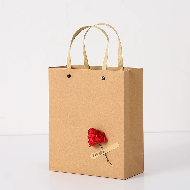 Kraft Paper Gift Bags With Handle And Decorative Flowers For Retail Packaging