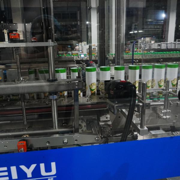 La machine entièrement automatique d'étiquetage des manches de boîtes a été testée en atelier et exportée en Indonésie