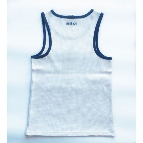 Mens tanktop featuring 100 percent cotton waffle fabric body solid color with contrast color rib piping around neck and armhole