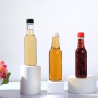 Bouteille en verre de ketchup de haute qualité de 12 oz de forme ronde pour la sauce