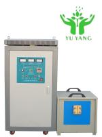 Système de chauffage par induction automatique pour le traitement des composants métalliques de production