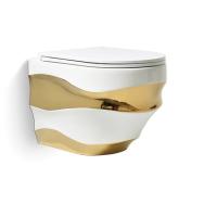 Des toilettes en céramique de marbre montées sur le mur, des toilettes sanitaires en une seule pièce