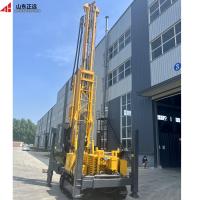 Machine de forage de puits d'eau sur chenilles